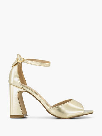 Claudia Ghizzani Gouden pump gesp