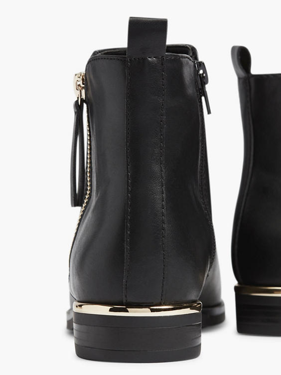 black chelsea boots with gold trim