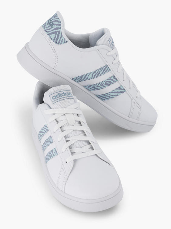 Witte sneaker met zebraprint details